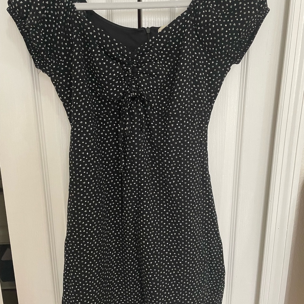 pacsun black dress with white flower detailing.